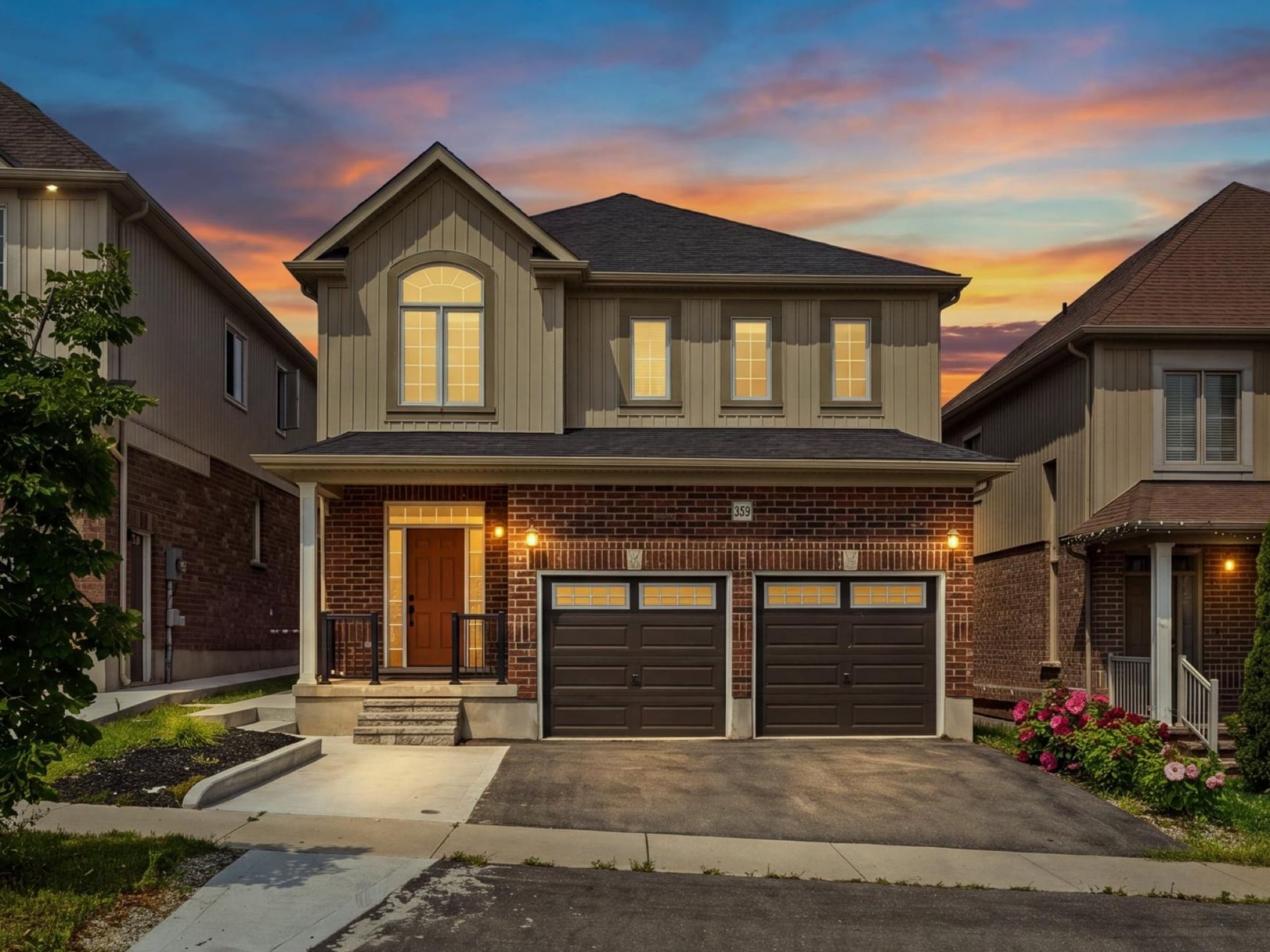 Front exterior of 359 Beechdrops Drive at dusk