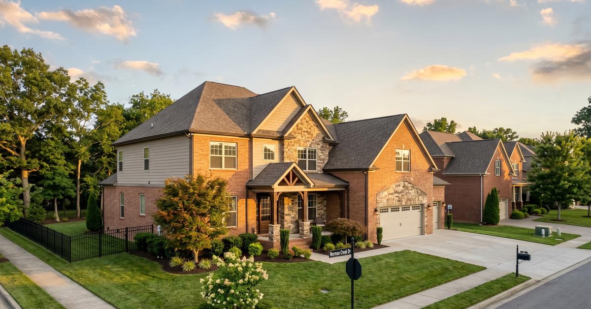 Brick and stone home on Macy Drive in Norman Creek Hendersonville TN 37075 with fenced backyard near Old Hickory Lake