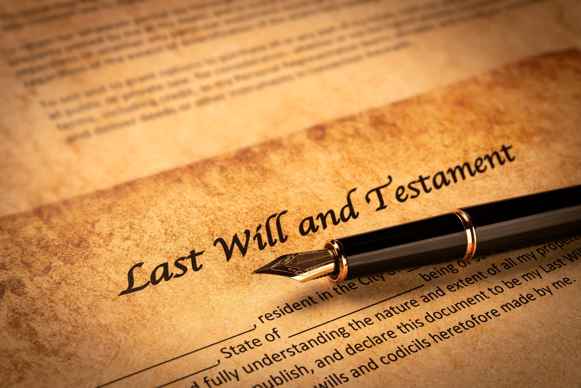 An unfilled out will and testament header shown on aged parchment paper for use to prepare