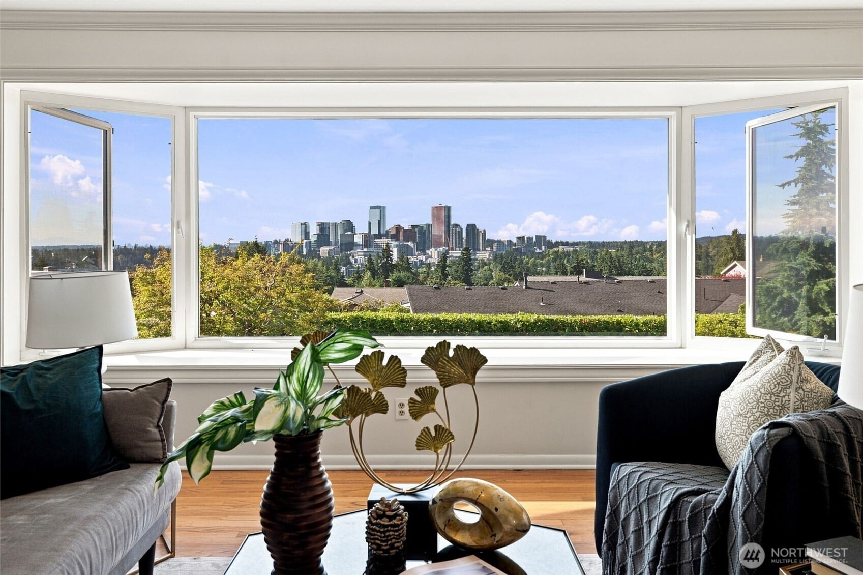 Seattle-area home interior with large picture window overlooking the Bellevue skyline.