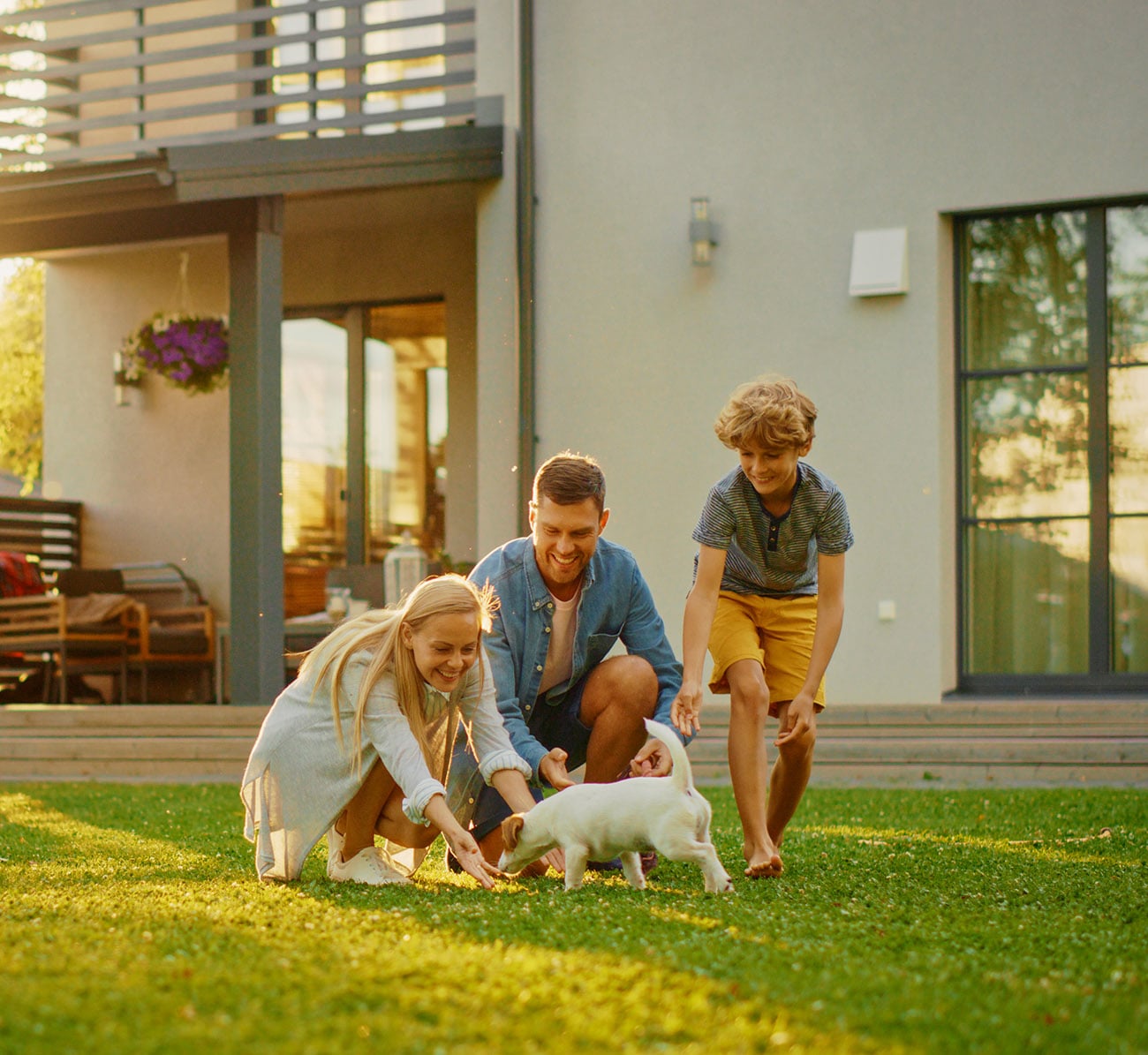 Smiling,Father,,Mother,And,Son,Pet,And,Play,With,Smooth