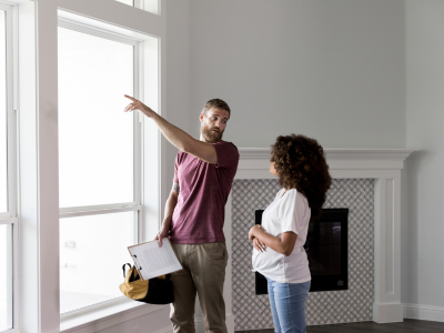 A contractor explaining something to a homeowner or tenant — knowledge being shared, not withheld