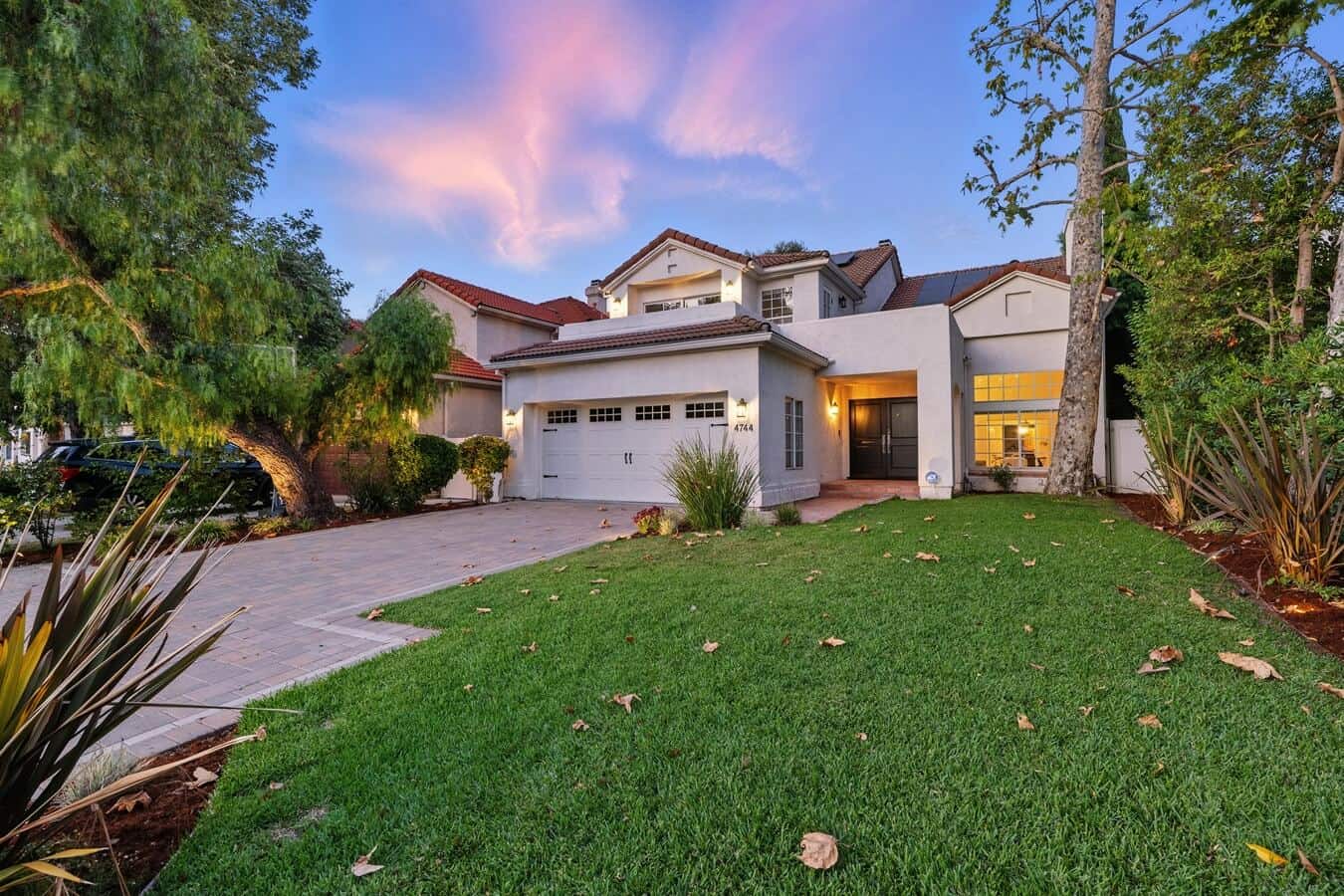 Enchanting two-story traditional with gated curb appeal