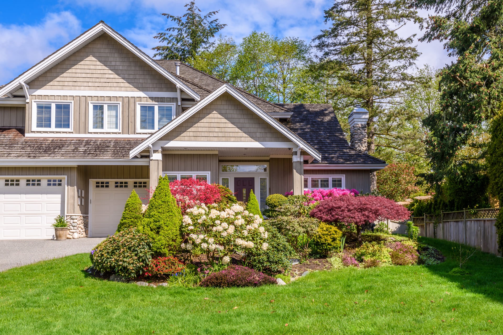 beige-house-with-a-garden