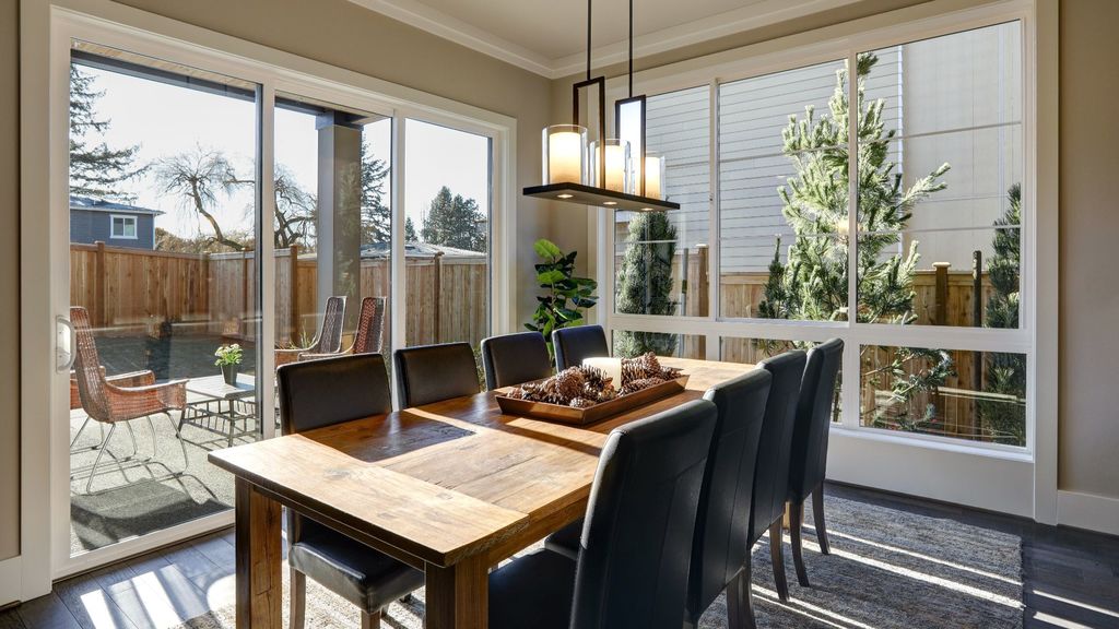 Sun filled dining room in new luxury home kitchen