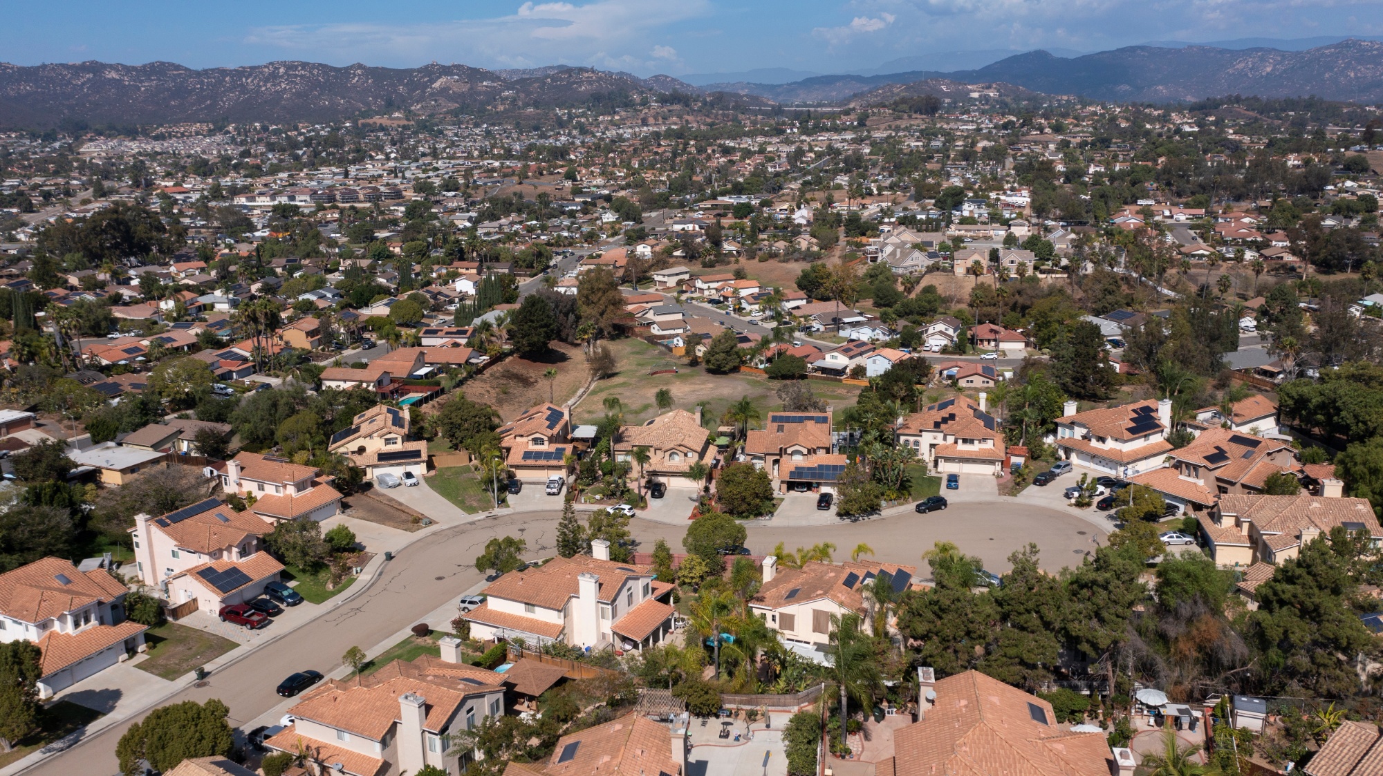 Afternoon aerial view of a suburban neighborhood in San Marcos, California, USA. (1)