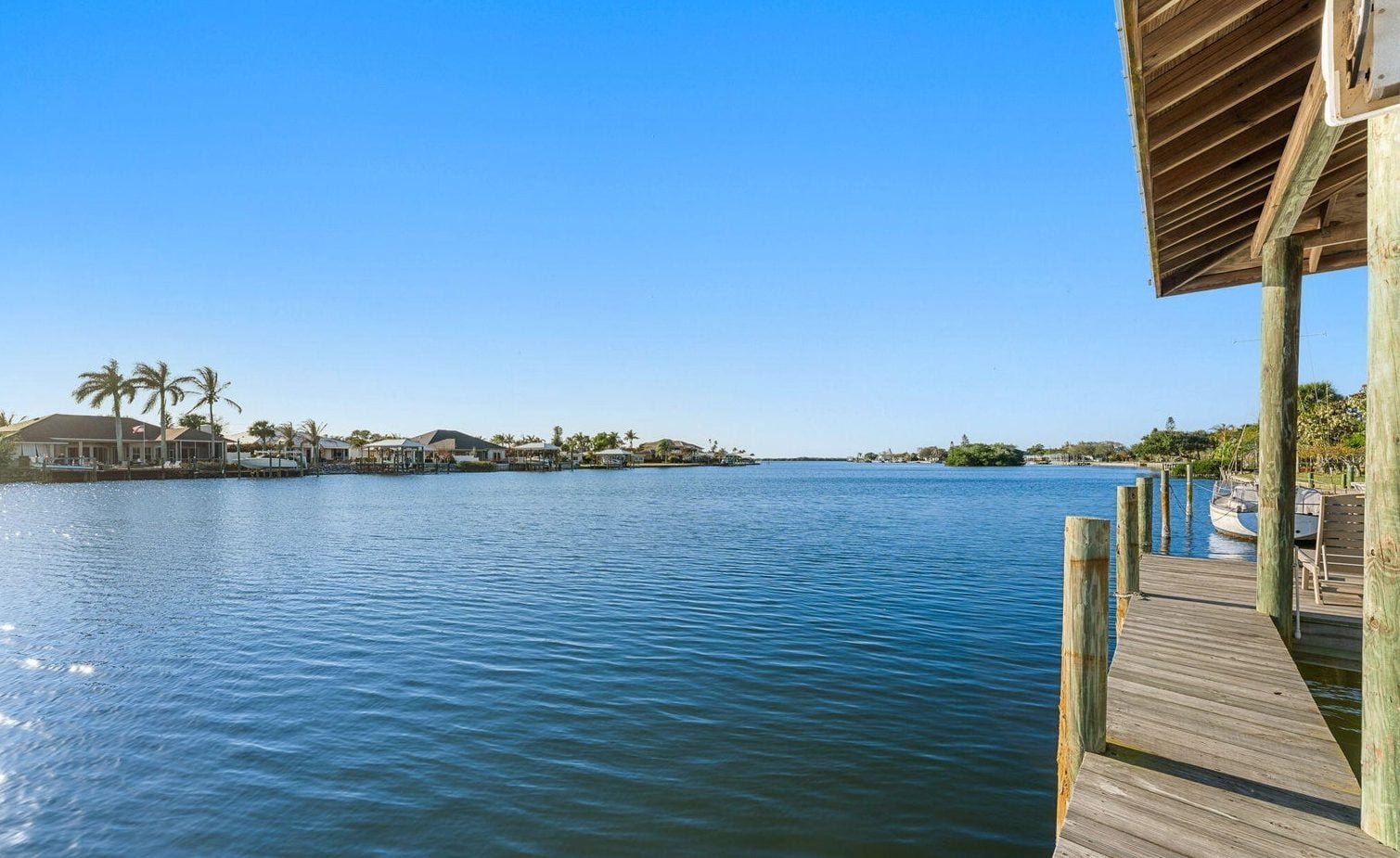 1470 Bay Shore Drive Cocoa Beach waterfront home listed by Bobby Freeman aerial view canal dock