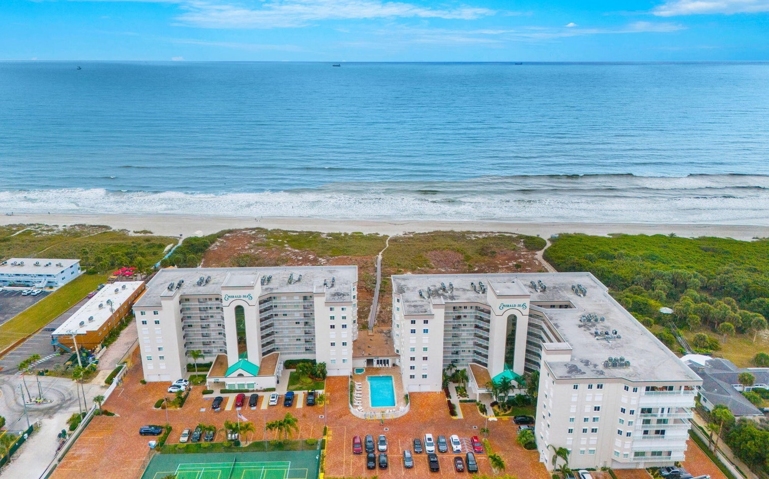 Emerald Seas oceanfront condo Cocoa Beach sold by Bobby Freeman McCoy Freeman Group at Compass