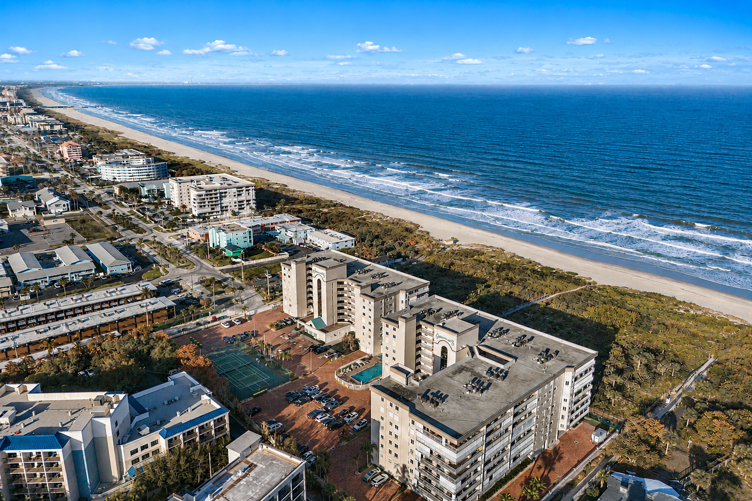Oceanfront balcony view from Emerald Seas condominium in Cocoa Beach, Florida
