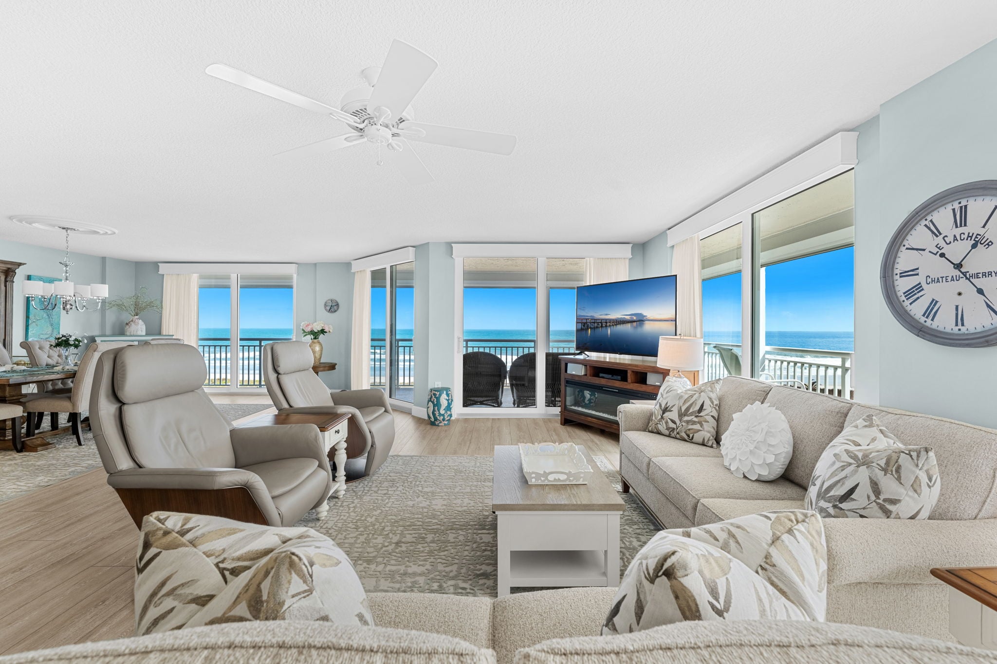 Remodeled living room inside Emerald Seas oceanfront condo in Cocoa Beach
