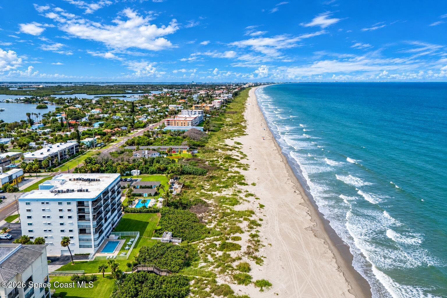 Aerial view of Wavecrest condominium at 1835 S Atlantic Ave on the Atlantic Ocean in Cocoa Beach Florida