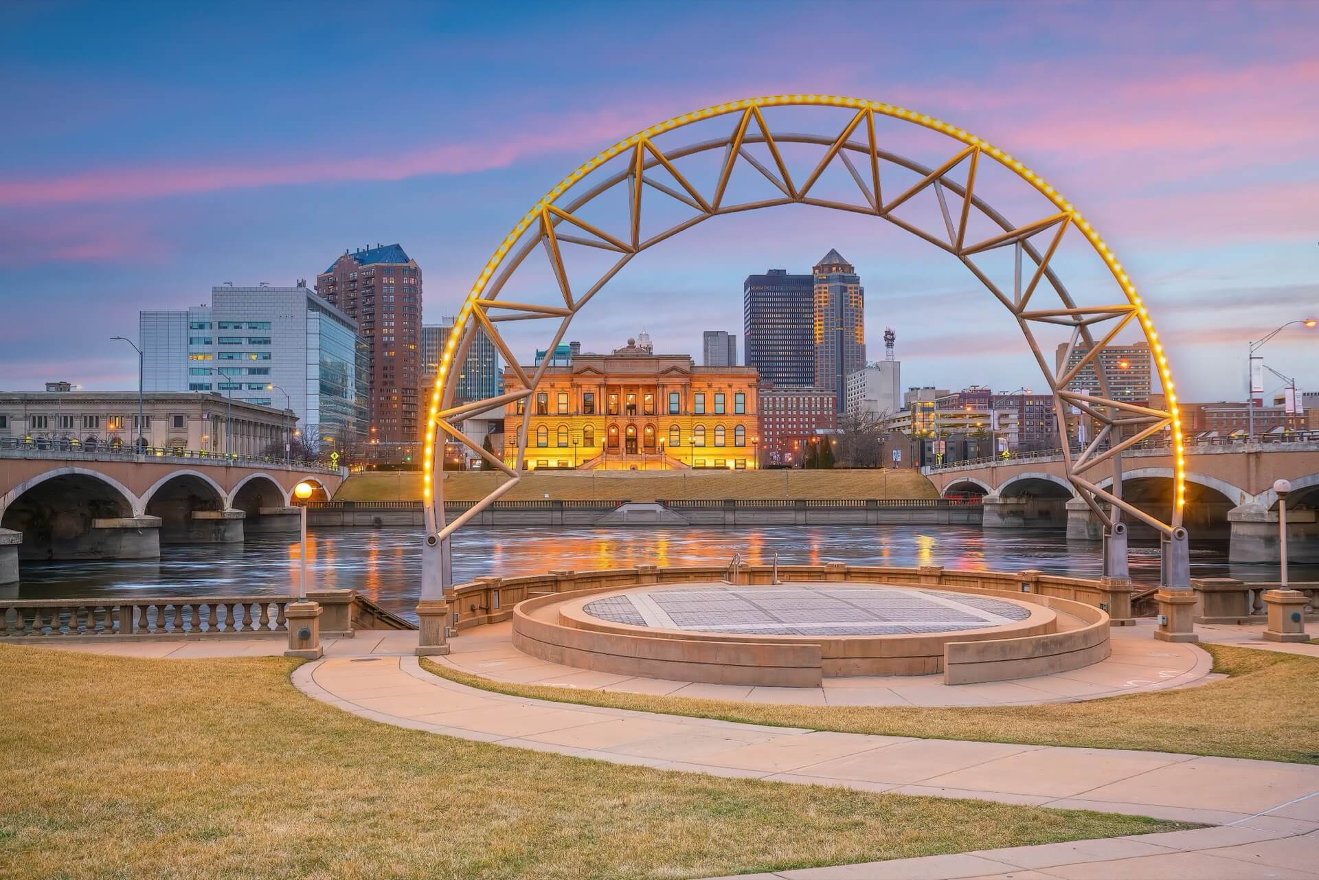 Downtown Des Moines city skyline cityscape of Iowa and public park in USA at sunset 1