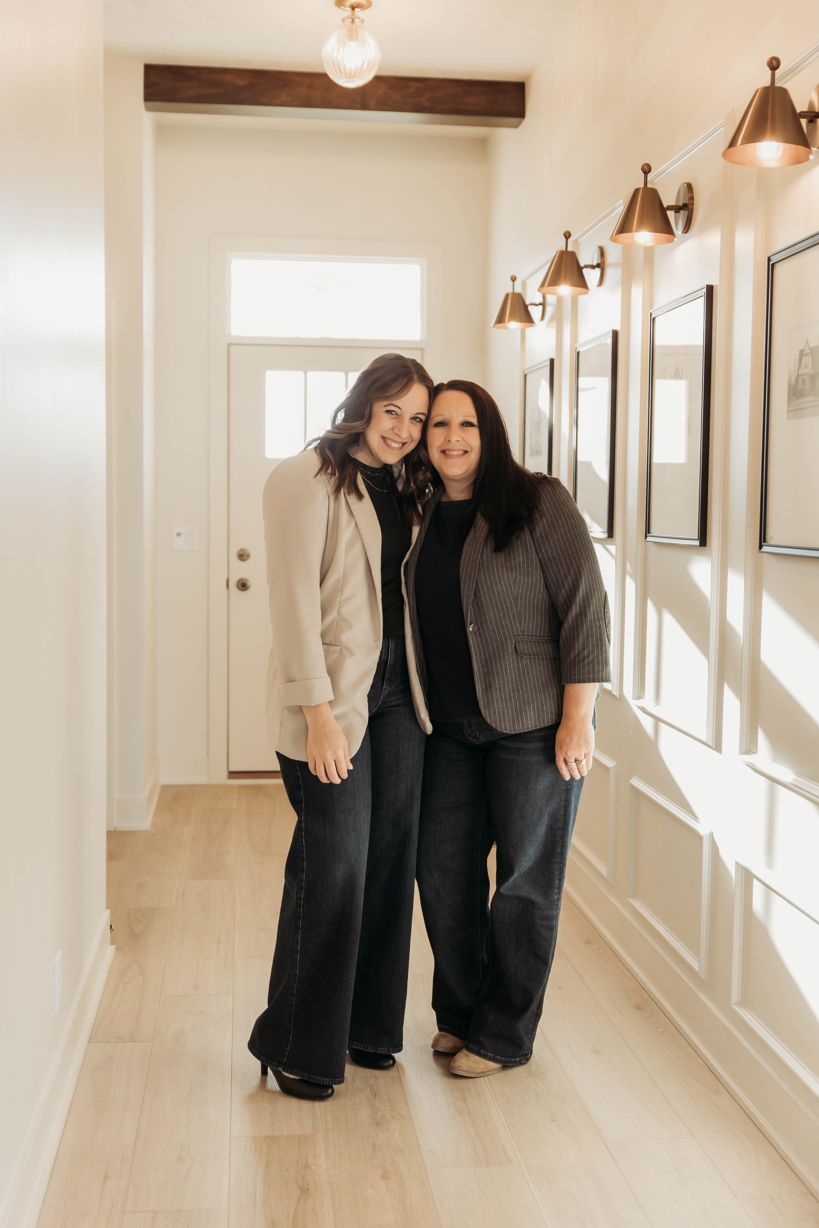 Elevate Realty Group team members in a bright hallway