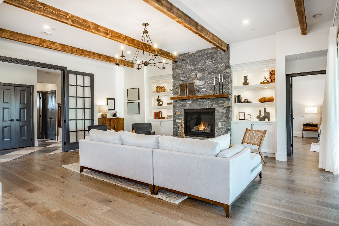 Living room with a stone fireplace