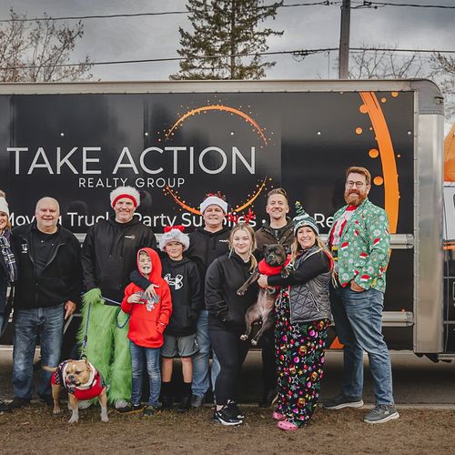 Take Action Realty Shines in Howard-Suamico’s Festive Christmas Parade