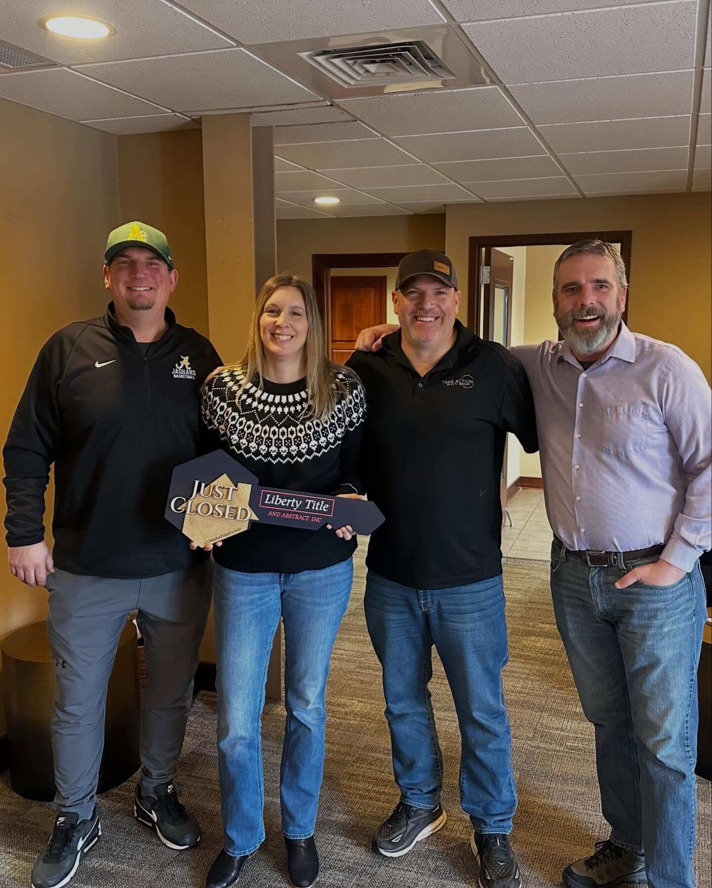 Monte with clients at closing