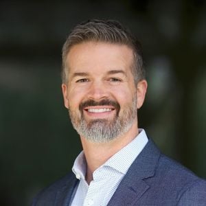 Professional headshot of Mike Lyon of Do You Convert.