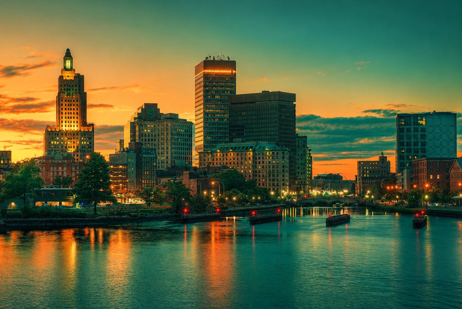 Providence Rhode Island skyline at sunset representing the market and business environment of Kyle Seyboth of Century 21 Limitless.