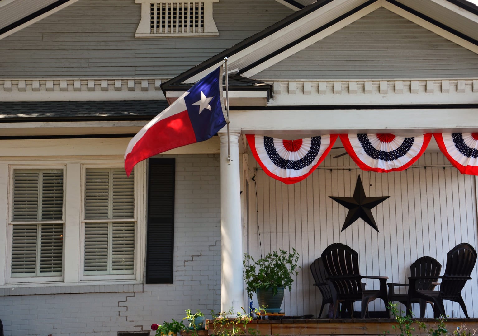 texas flag on a porch