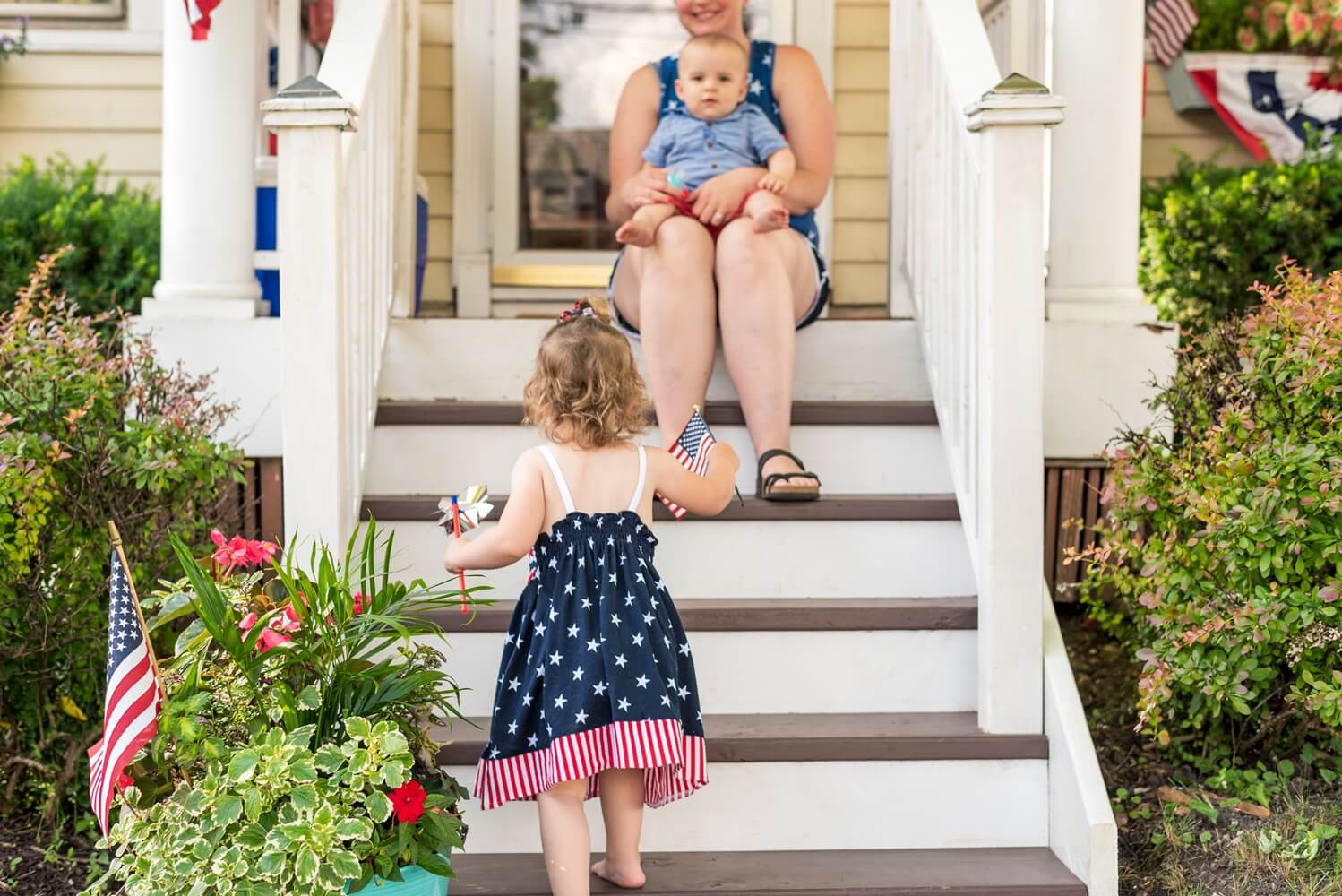 Young family on the front porch
