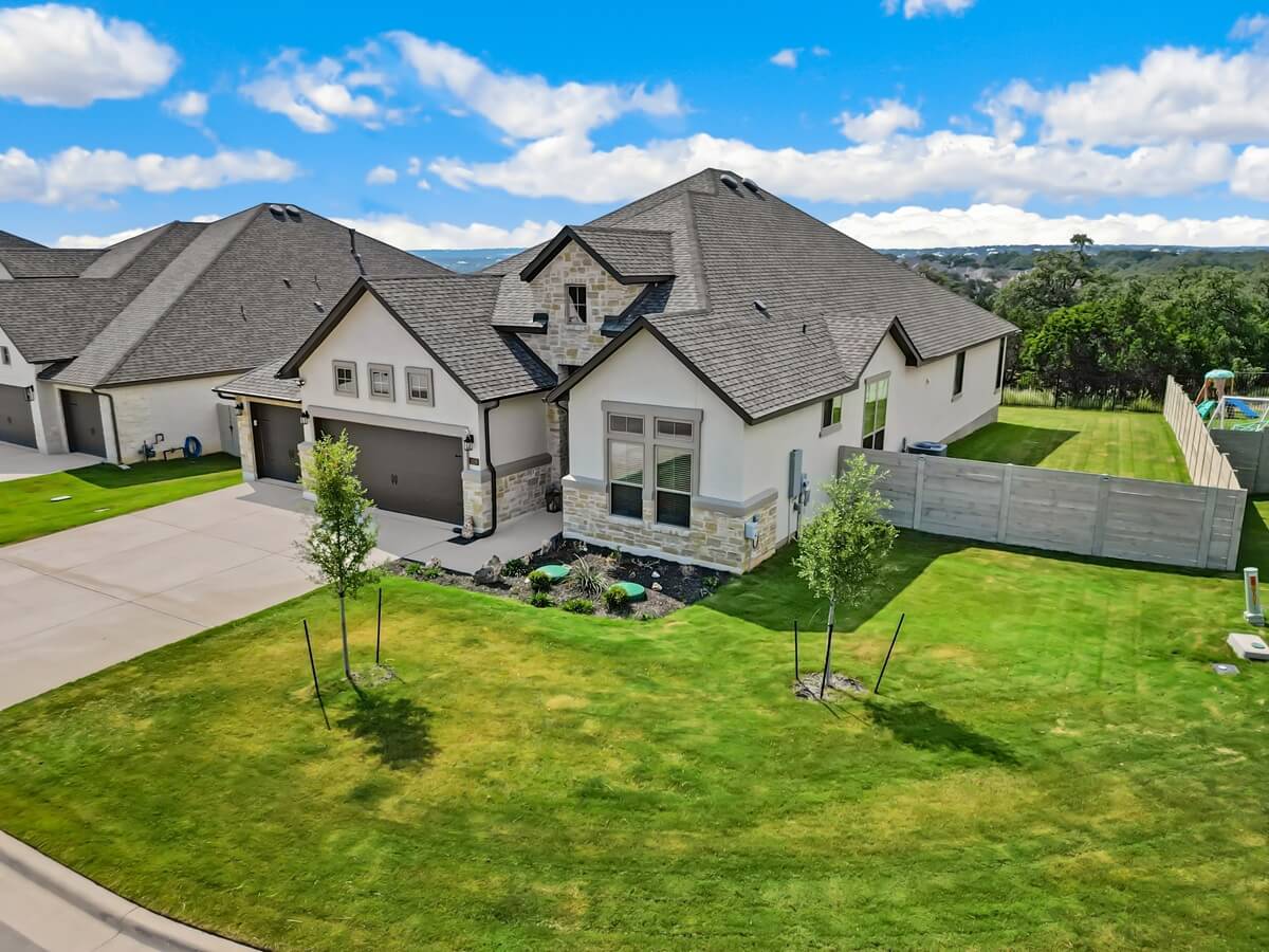 a home with grass and trees