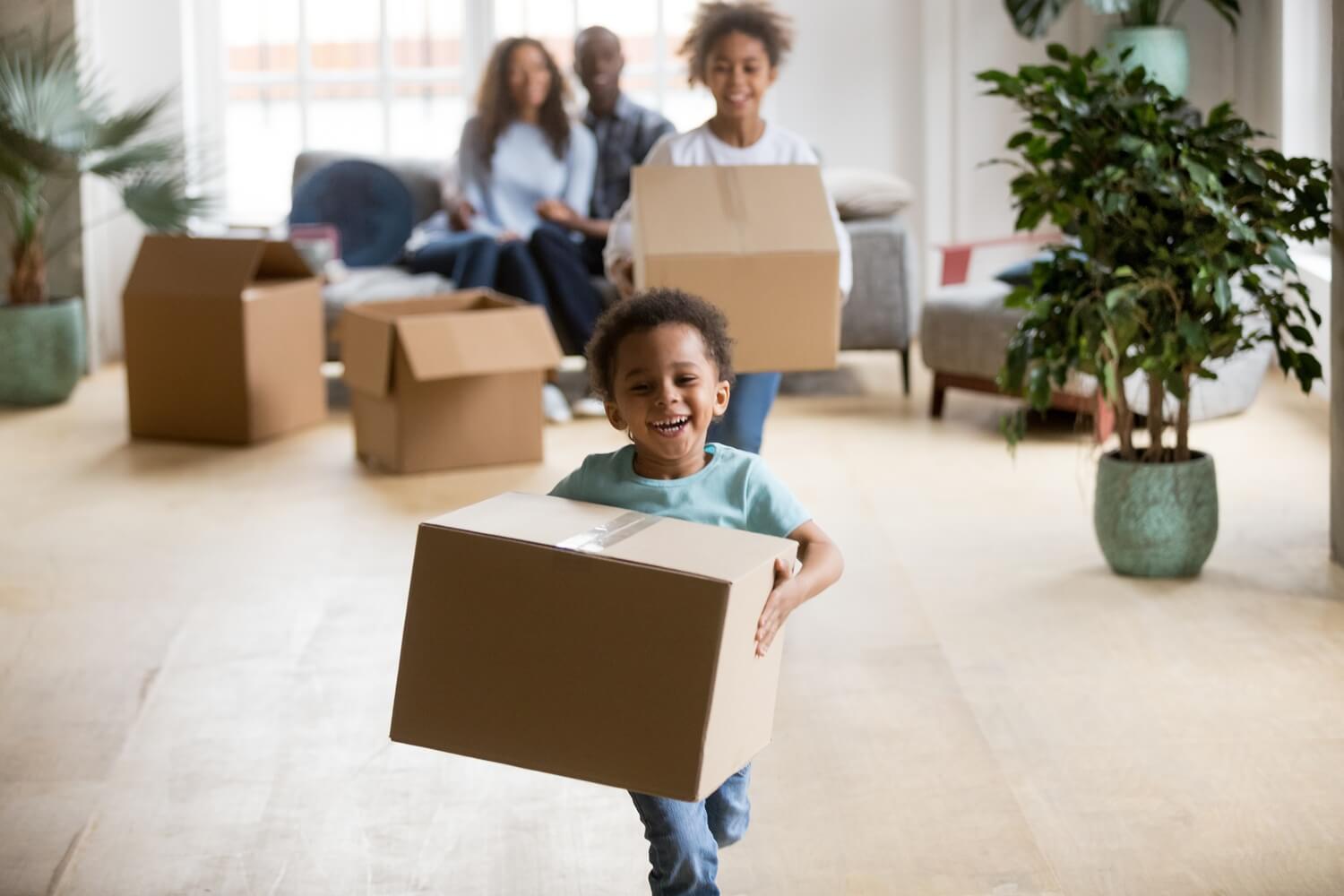 children enjoying moving day running