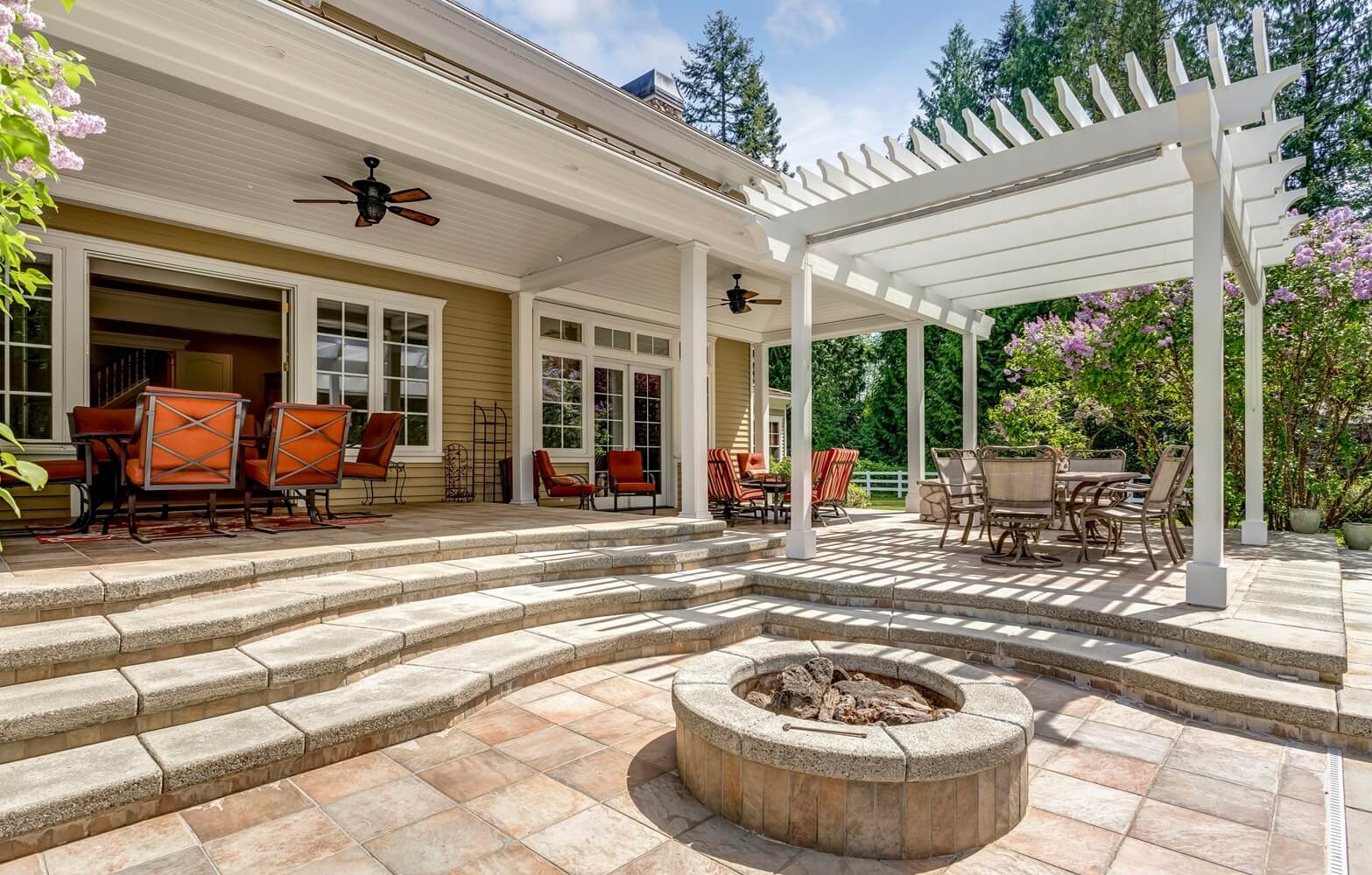 Luxury outdoor patio with a white pergola