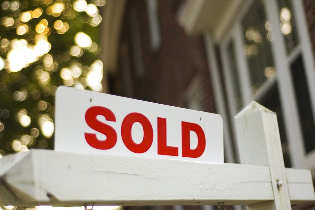 sold-sign-white-red-1024x681