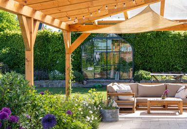 Covered,Terrace,With,Furniture,In,The,Garden,,Glasshouse,In,The
