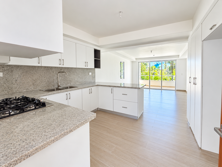 Bright Modern Kitchen with Tropical Balcony View