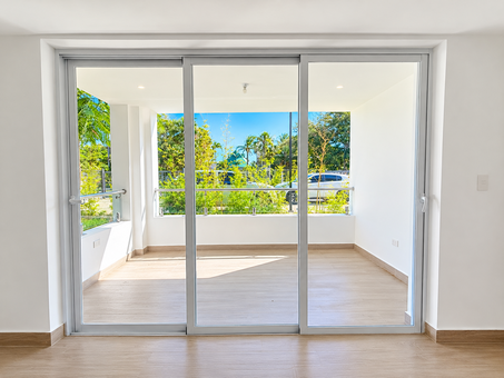 Modern Sliding Glass Doors to Tropical Balcony