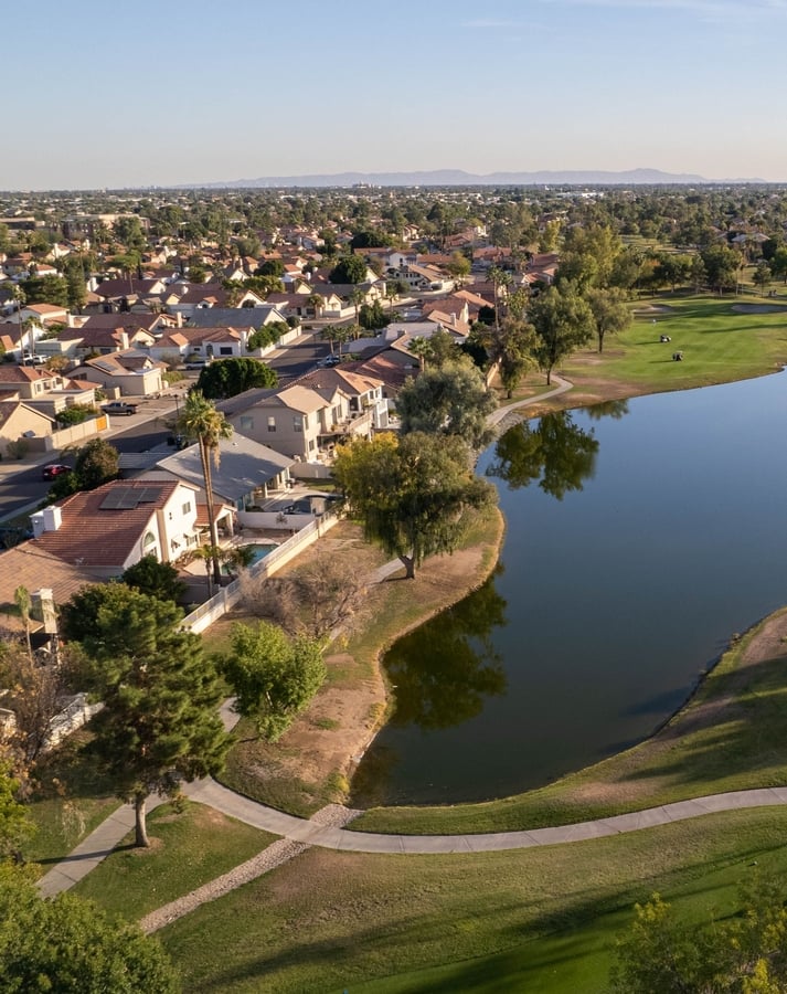 A,Scenic,Residential,Area,With,Green,Trees,And,A,Lake. - The AZ Home Co.