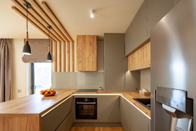 Beautiful-Grey-Modern-Kitchen-in-a-Luxury-Apartment-with-Stainless-Steel-Appliances-small