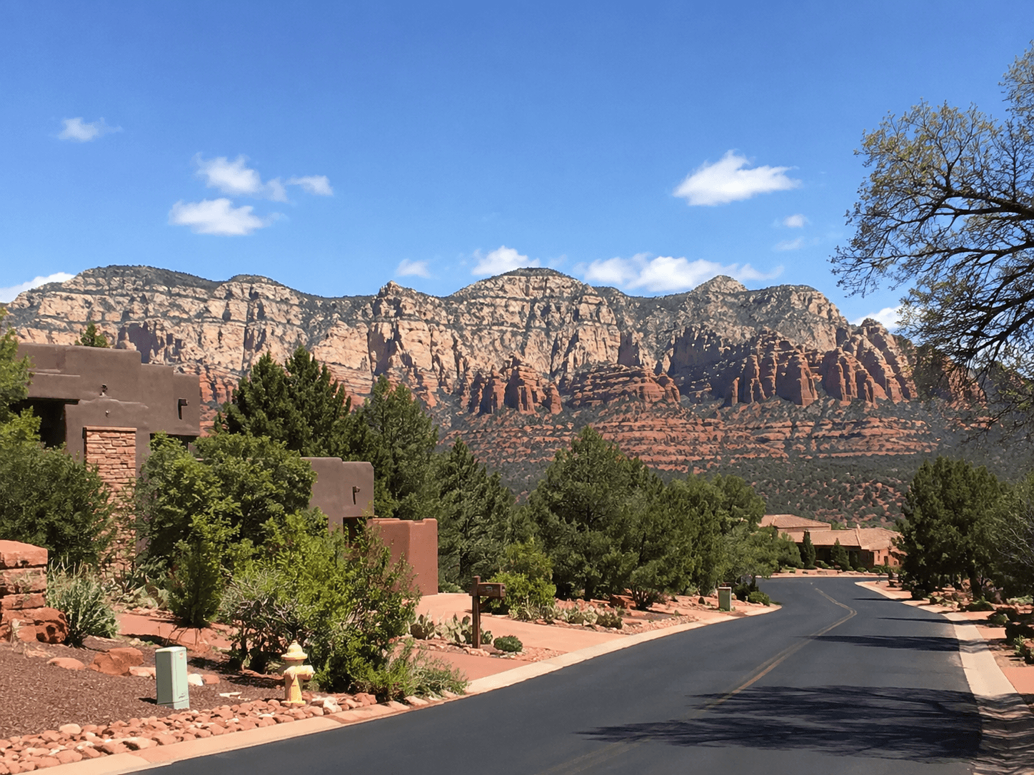 Desert road with red rock backdrop, Thunder Mountain, Sedona