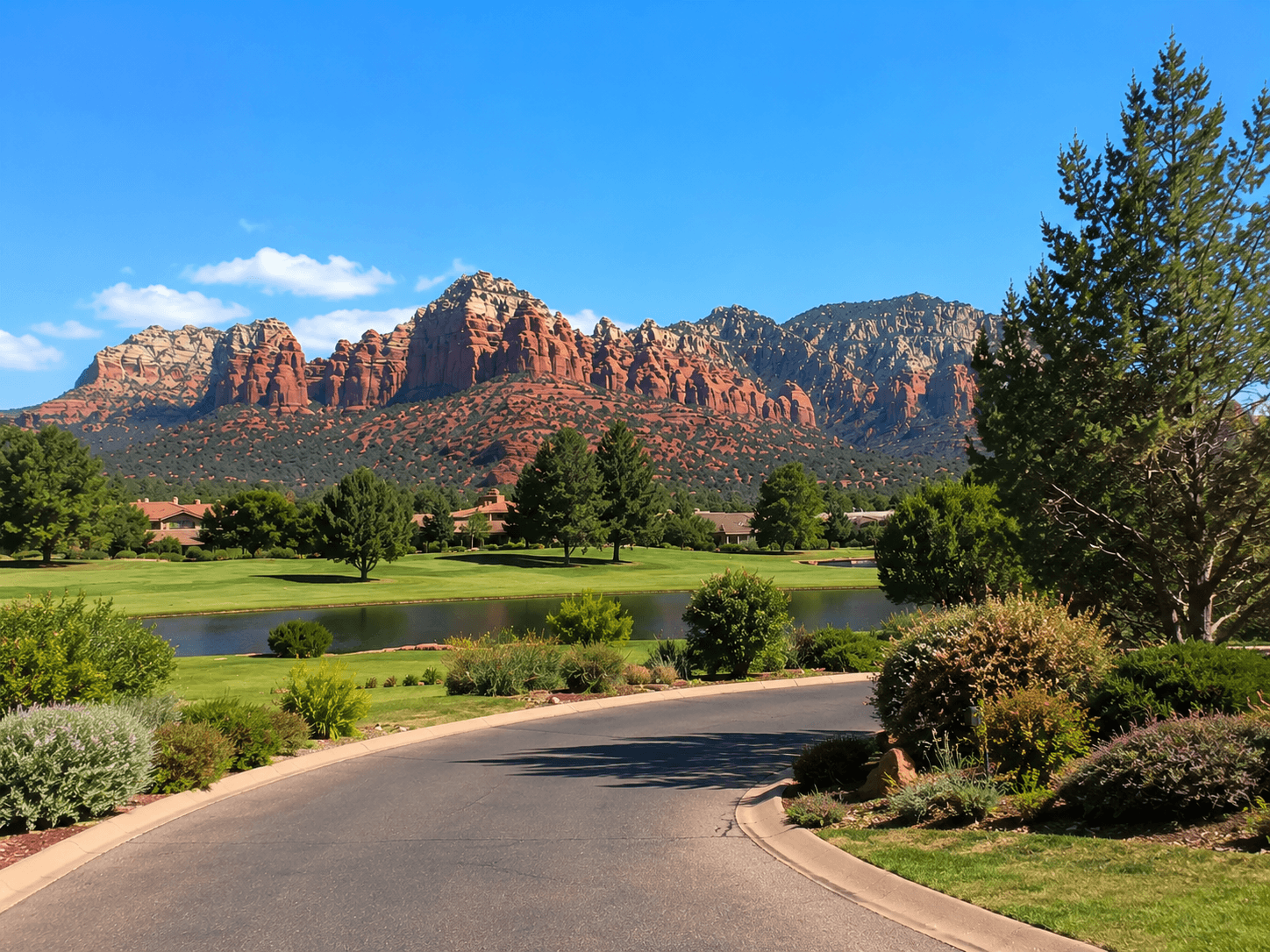 Scenic desert landscape with curving road, Oak Creek Country Club