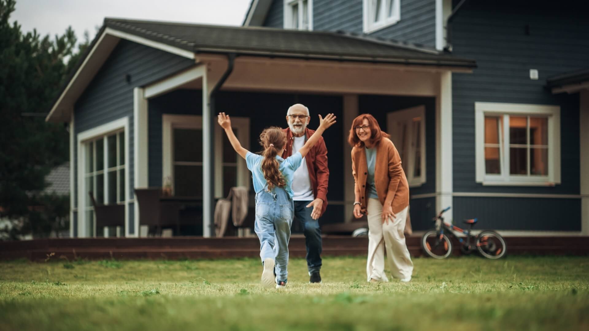 grandparents-greeting-child-home