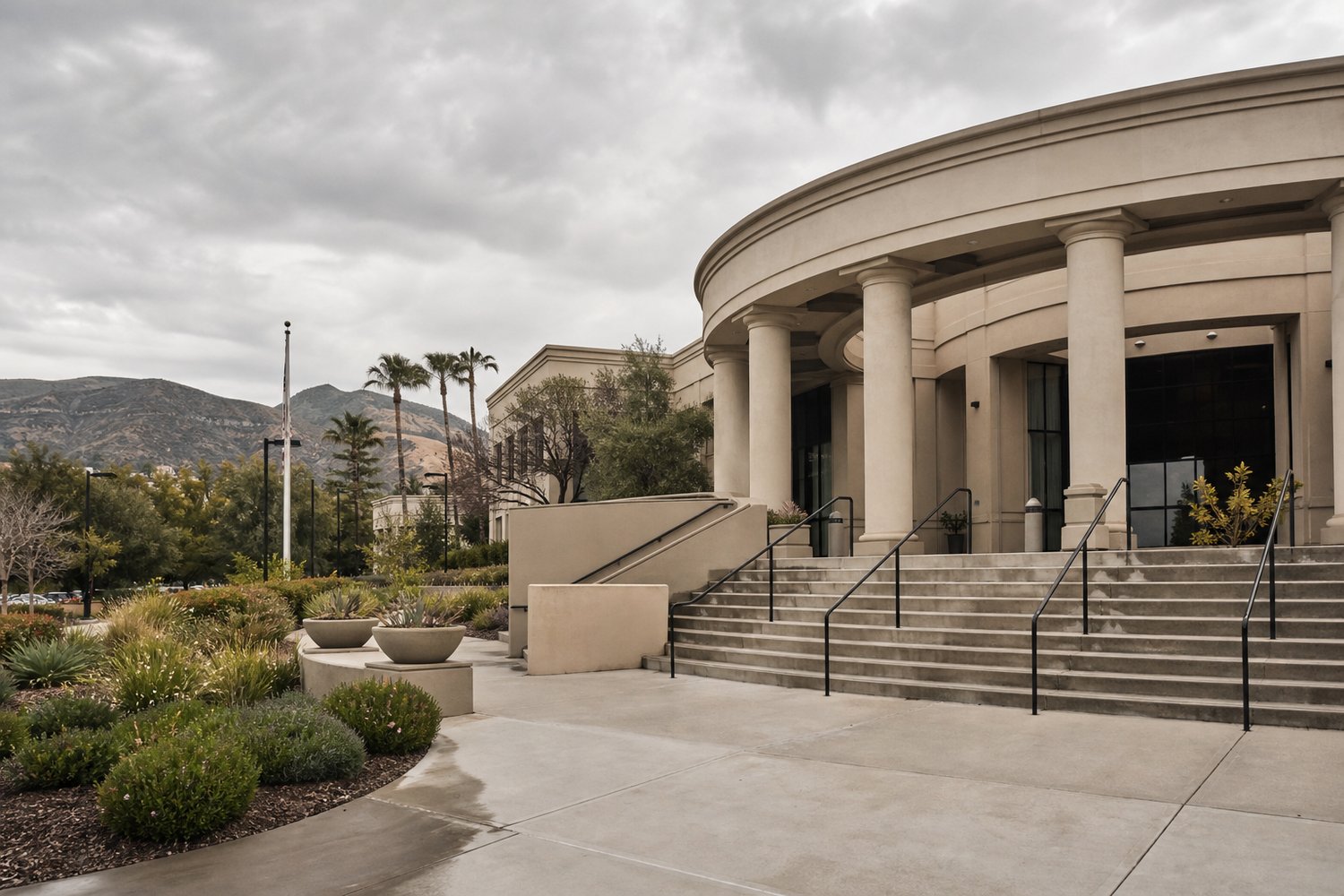 Rounded civic building with columns and a wide stone staircase near hills in Temecula Wine Country, California