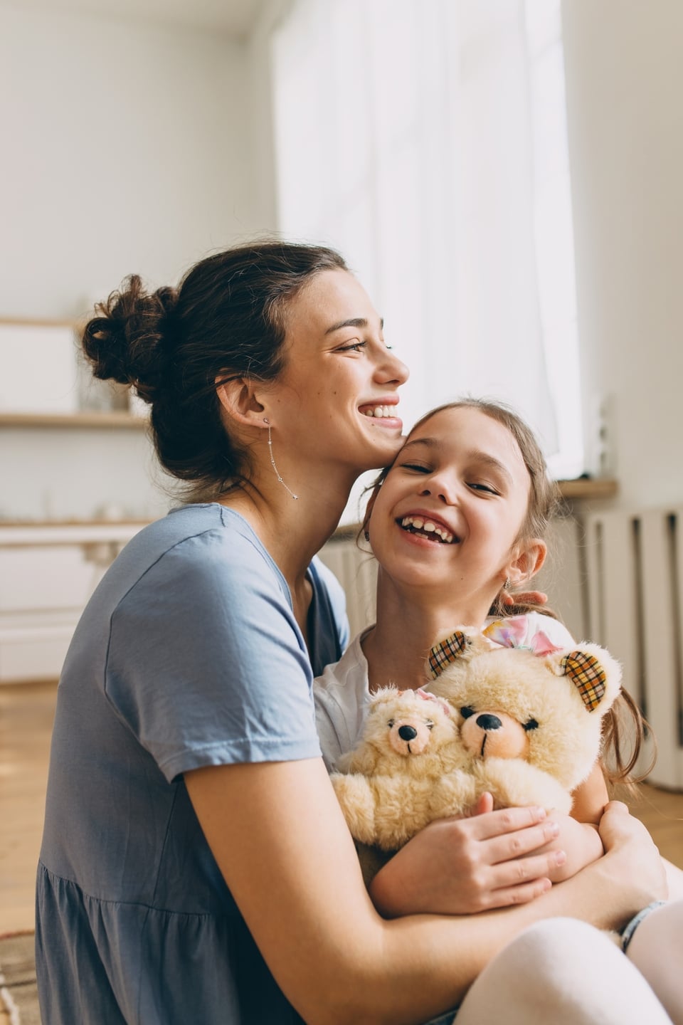 Smiling,Mother,Hugging,Cute,Little,Girl,Holding,Teddy,Bear,Toy,