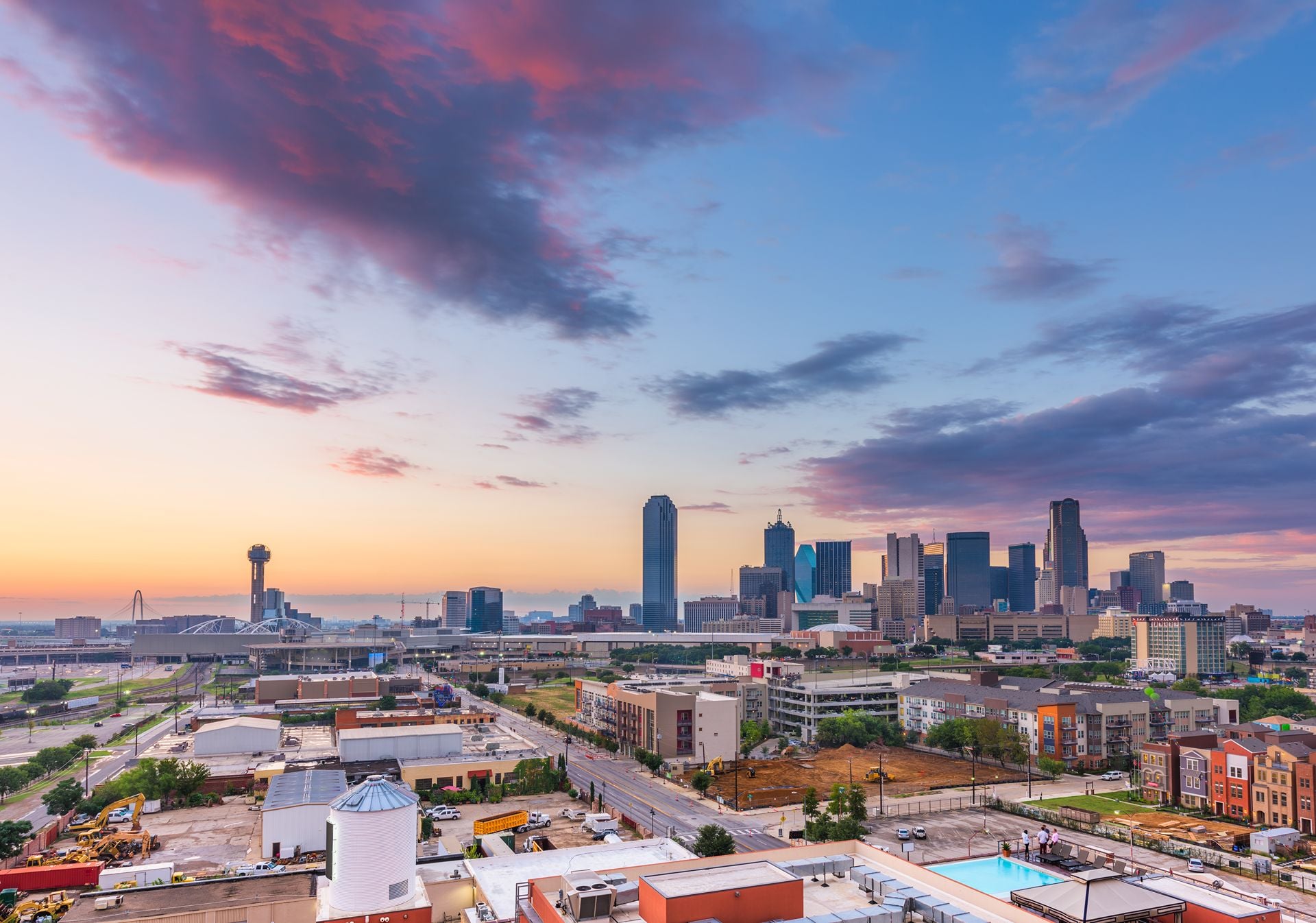 Dallas, Texas, USA downtown city skyline at dusk.