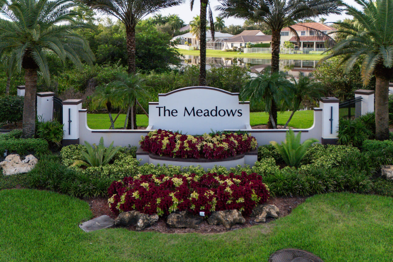 entrance-sign-with-plants