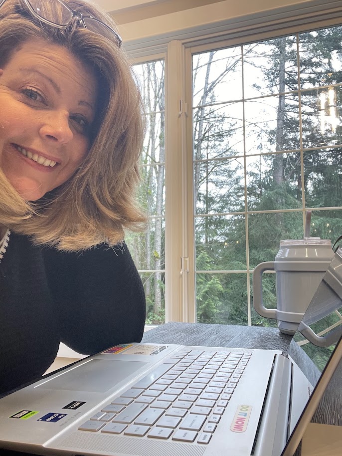 Brandice Raybourn Sitting at computer