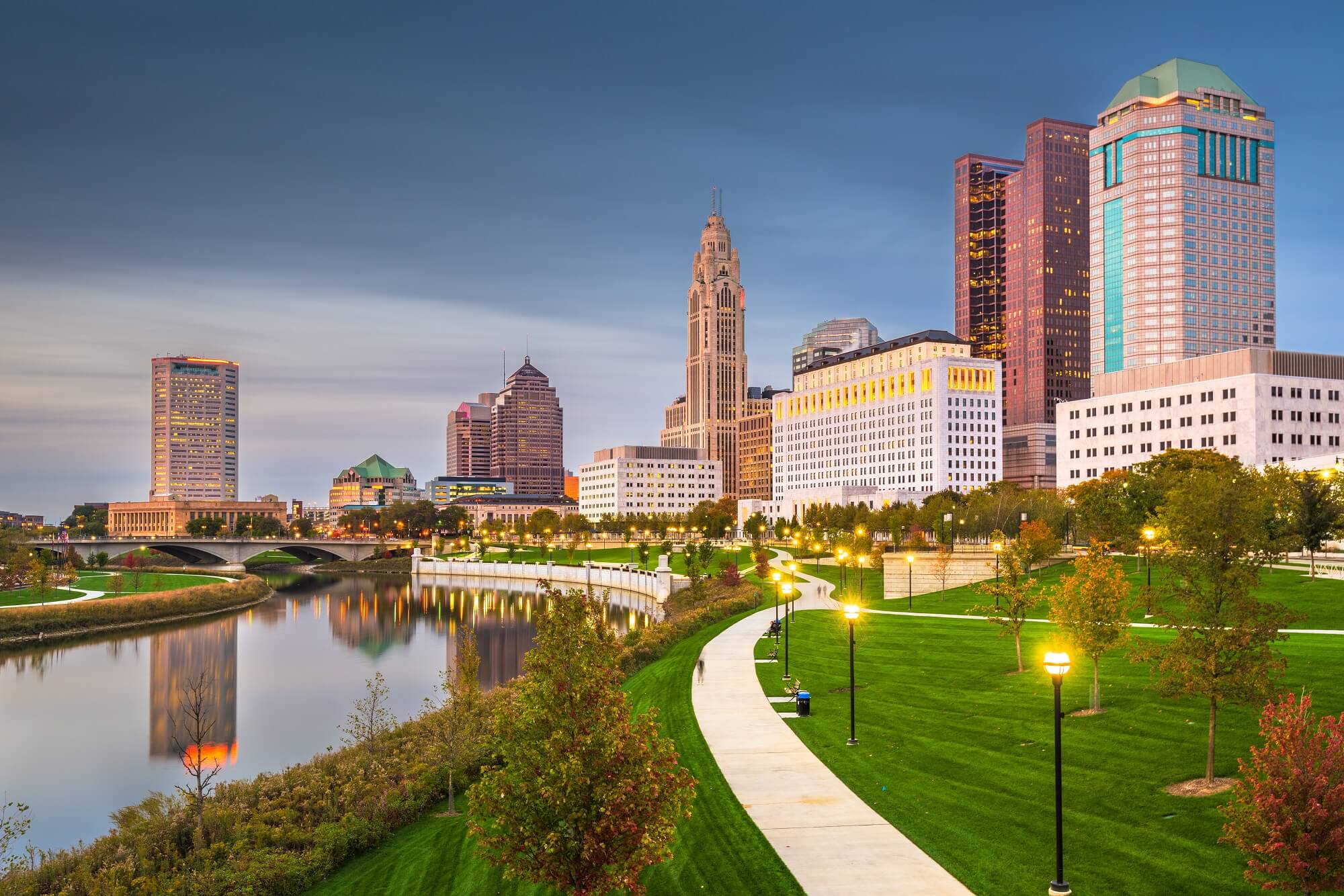 Columbus, Ohio, USA skyline on the river at dusk.