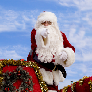 Santa waving to the crowd at the Annual Sarasota Holiday Parade