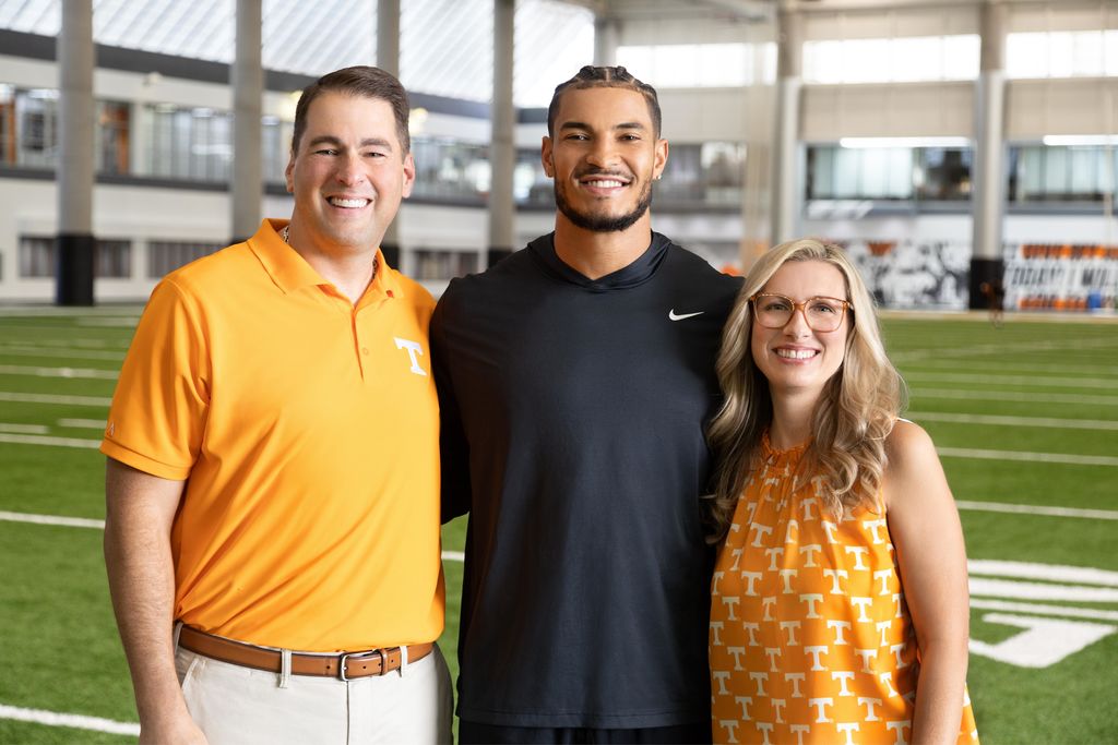 Ryan and April Coleman of Hometown Realty with Bru McCoy at Anderson Training Center