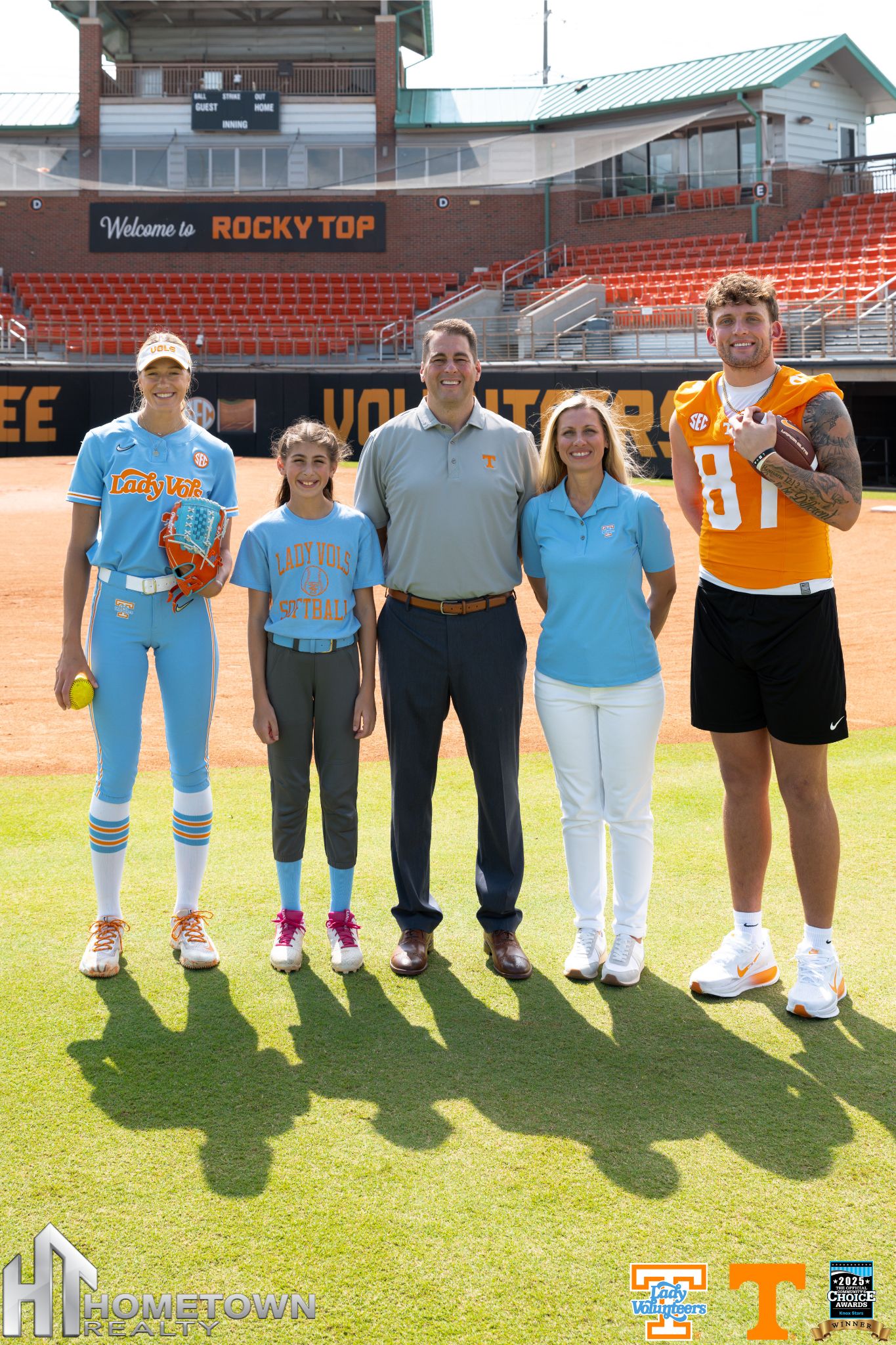 Untitled designTennessee athletes Miles Kitselman and Karlyn Pickens with Ryan and April Coleman of Hometown Realty, joined by their daughter Kinsley Coleman.