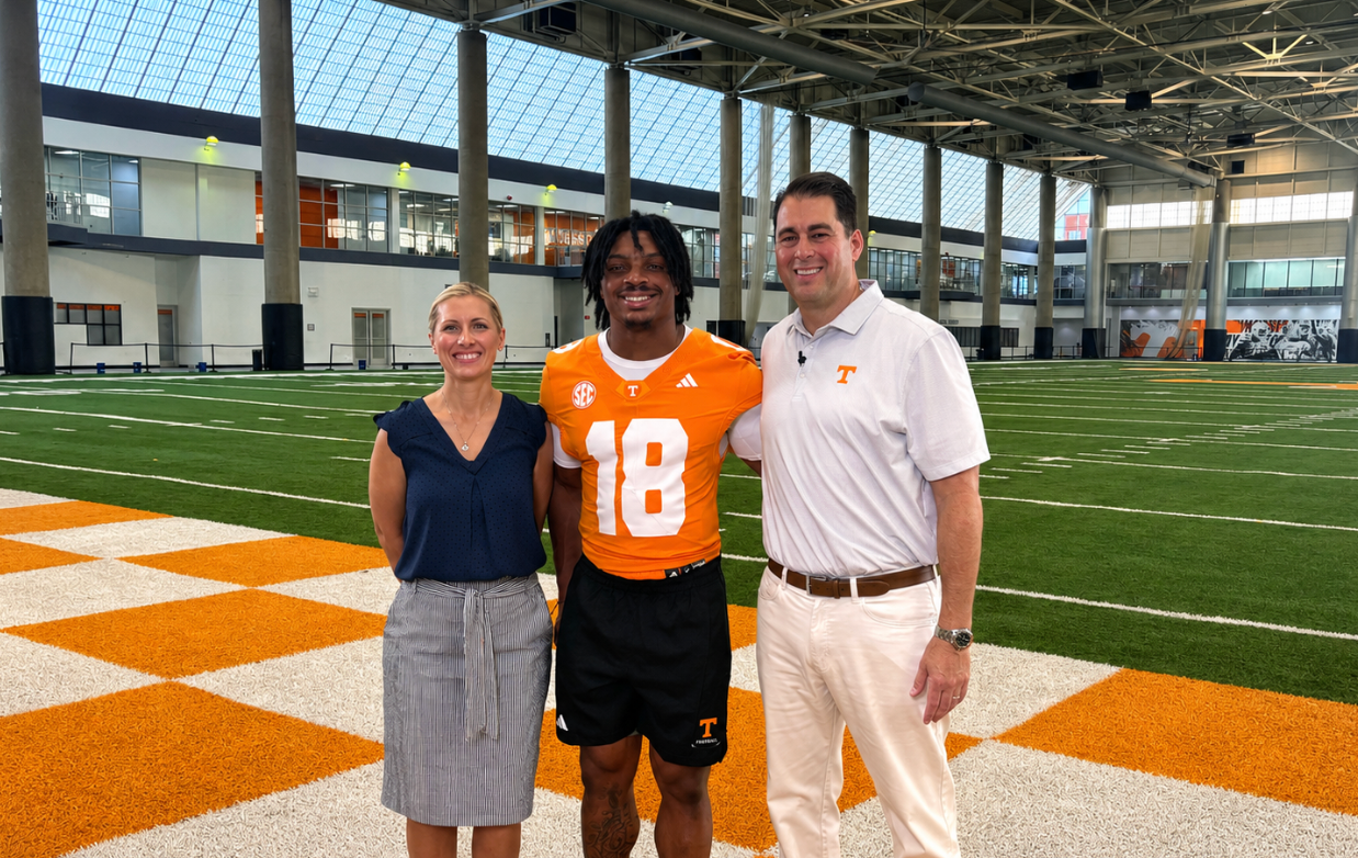 TN Vols DeSean Bishop with Ryan and April Coleman of Hometown Realty