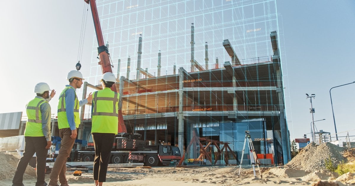 A group of investors—wearing hi-vis PPE gear—inspecting the progress of their new construction investment project.