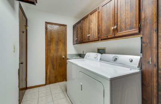 laundry, dryer, washer, cabinets