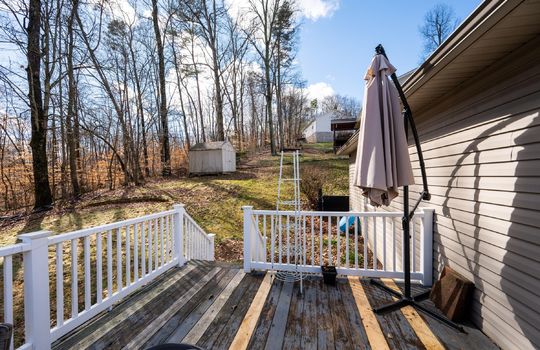 back deck, porch, fence, trees