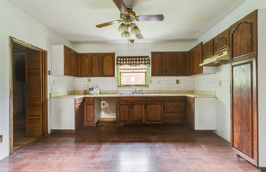 kitchen, ceiling fan, hardwood cabinet